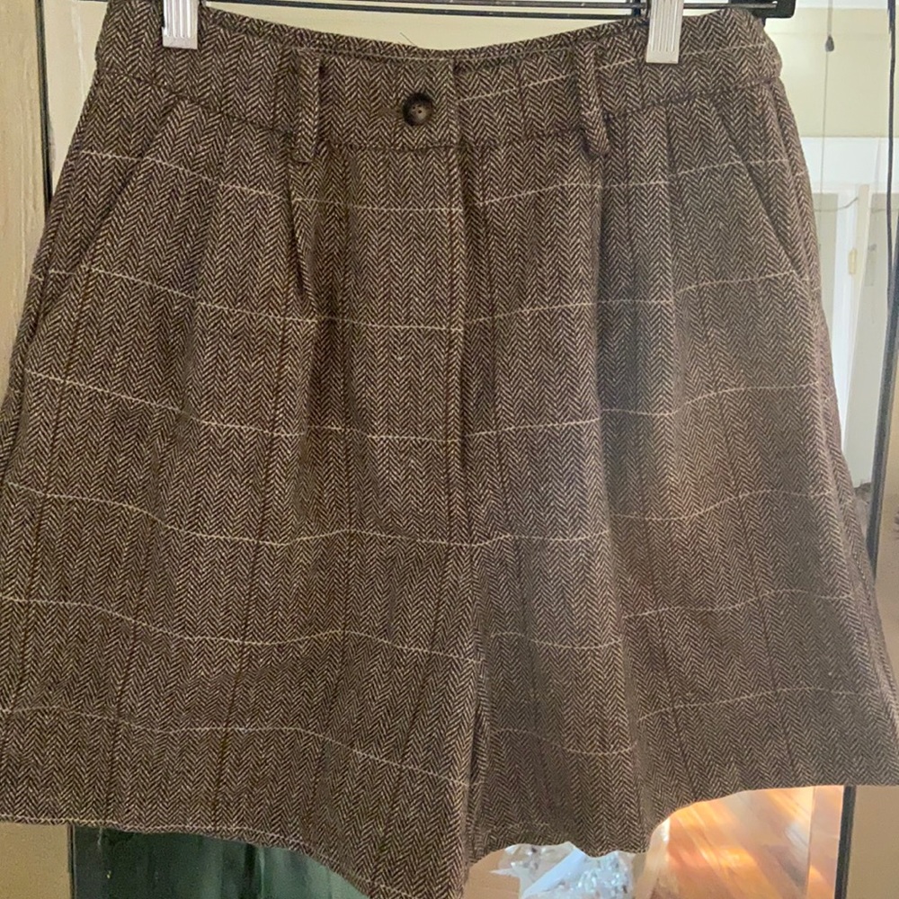 High waisted pleated shorts.